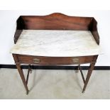 A late 19th Century mahogany bow front washstand, marble top, shaped mahogany splash back, long