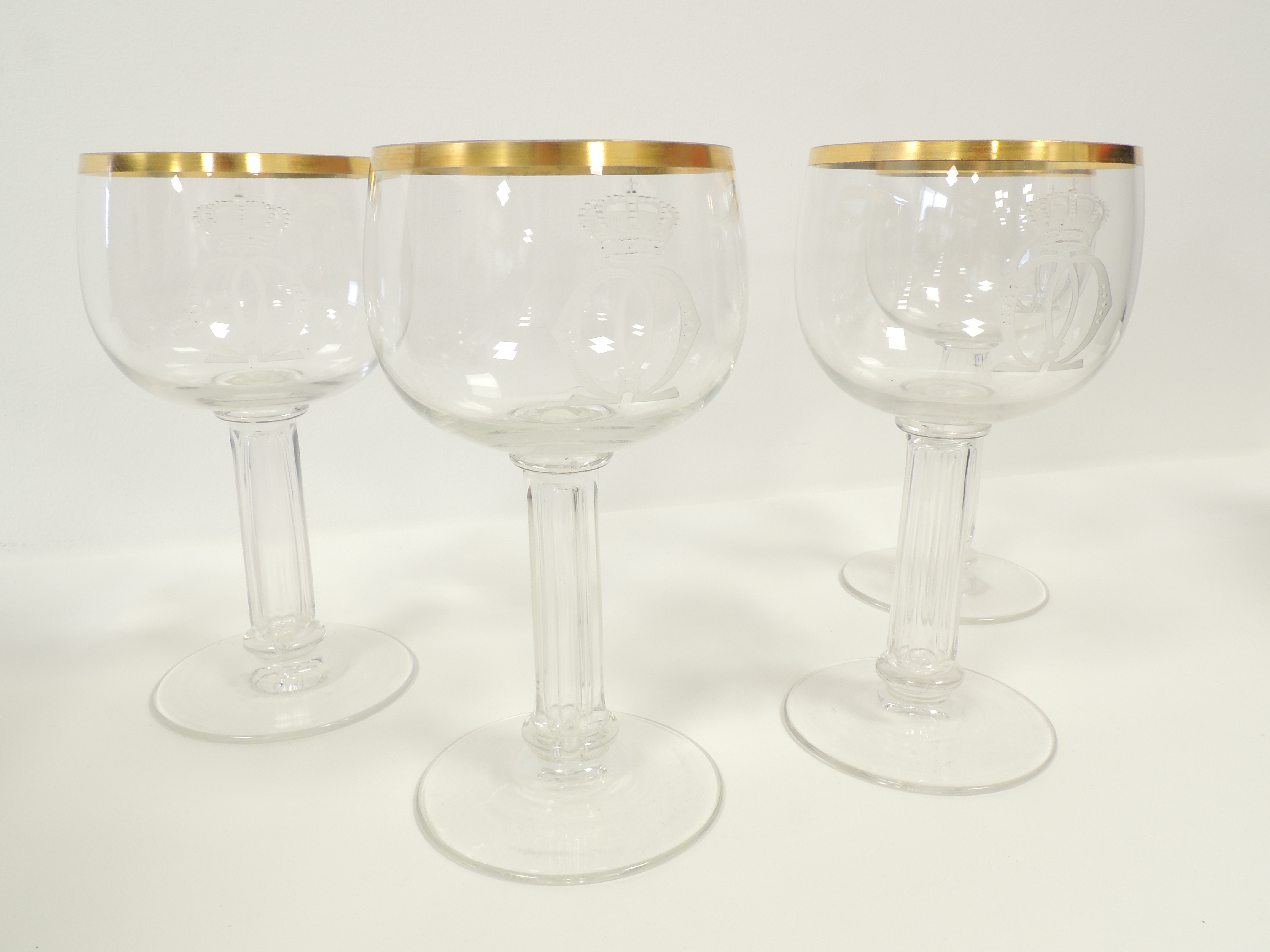 Four German glasses with engraved interlaced decoration surmounted by crowns, raised on multifaceted - Image 3 of 3