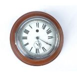 A chrome plated ships clock, white enamel dial with Roman numerals and subsidiary seconds dial,