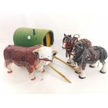 A model of a Gypsy caravan, height 40cm, together with a pair of Melba ware shire horses and a