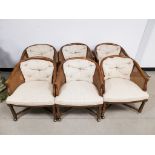 Set of six bergere cane arm chairs, set on square form legs, cross section stretchers, brass