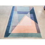 20th Century modern 'Pyramid' Indian woollen rug, of geometric design in different shades of blue