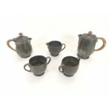 A Liberty tudric pewter five piece coffee set, including hot water pots, twin handled cups and
