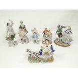A pair of 20th Century Sitzendorf porcelain figures, a young woman and a young gentleman both