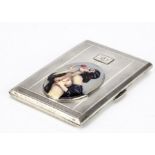 An Art Deco style silver cigarette case, with later applied enamelled print panel of scantily clad