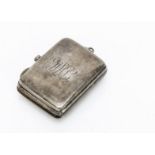 A George V silver vesta case, with initials to front and fob bale ring