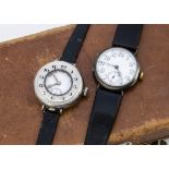 Two WWI period silver cased trench style wristwatches, one half hunter style, 34mm, the other