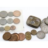 A small collection of British and world coins, including 9 George V half crowns and 3 florins, a