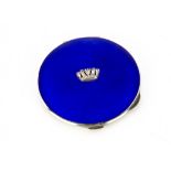 A 1940s silver and enamelled compact, blue enamel to cover with Naval crest, 7.5 cm, appears in good
