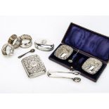 A small group of Victorian and later and silver items, including a cased pair of salts, lacks one