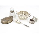 Five items of silver, including a twin handled bowl, spoon, two napkin rings and a fan shaped box,