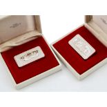 Two 1970s Franklin Mint silver Christmas Ingots, for 1974 and 1975, each in fitted box and 2.1 ozt