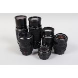 A Group of Pentax Lenses, a SMC Pentax M 28mm f/2.8 lens, barrel G, elements G, a Pentax A 28-80mm