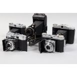 A Tray of Folding Cameras, a Kodak Retinette (type 017, shutter sluggish, body G. a Voitlander