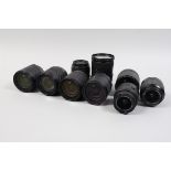 A Group of Nikon AF Lenses, two AF-S Nikkor 18-55mm f/3.5-5.6 DX ED, an 18-55mm f/3.5-5.6 DX VR GII,