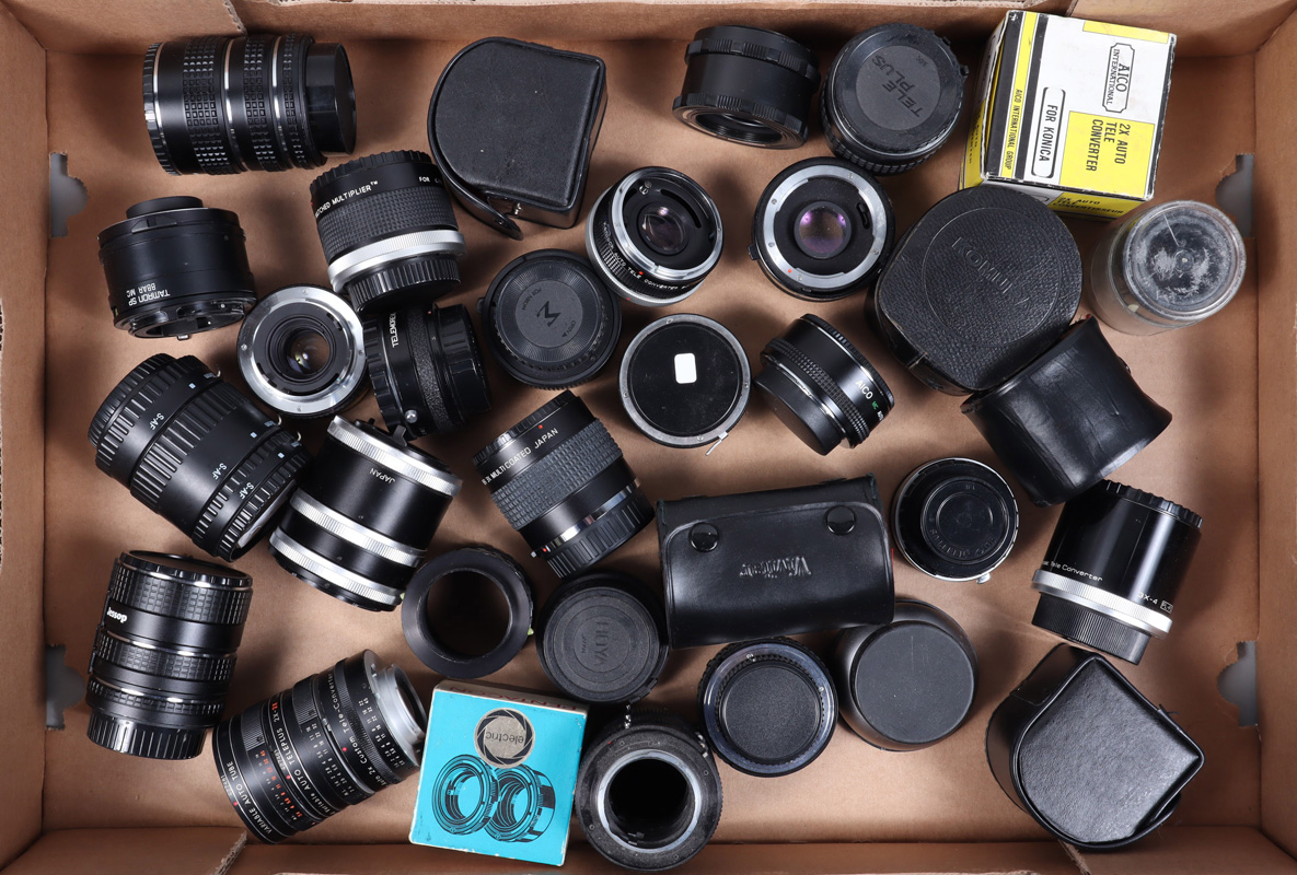 A Tray of Tele Convertors and Tubes, manufacturers include Teleplus, Hoya, Vivitar, Tamron and other