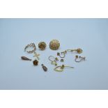 A small collection of 9ct gold and yellow metal, marked 9ct gold to include a band, earrings, etc
