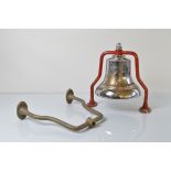 A 1950s chromed fire bell, with painted brass mountings (missing clapper).