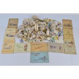 A collection of assorted tea and cigarette cards, including Players and Wills albums, loose Brooke