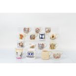 A collection of assorted Royal commemorative mugs, including Queen Victoria Golden Jubilee, George V