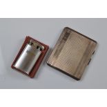 A George VI silver cigarette case, with engine turned decoration, banded design, with engraved