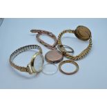 A small quantity of gold watch straps and cases, including a 9ct expandable bracelet, various