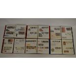 Twelve albums containing First Day Covers, each album containing a large quantity of FDCs with dates