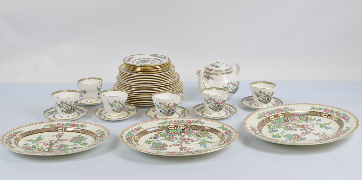 A Duchess fine bone china dinner service, including teapot, cups, saucers, plates, chargers etc.