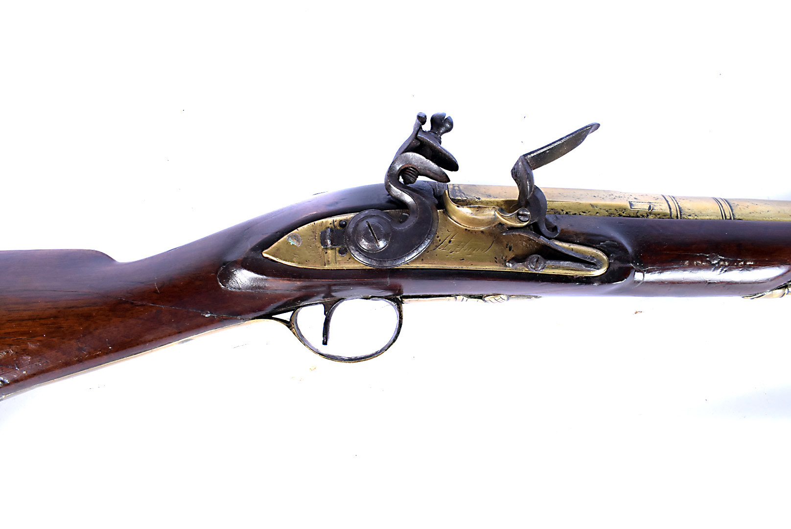A brass barrelled flintlock blunderbuss, with indistinct London maker's name to the lock plate,
