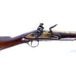 A brass barrelled flintlock blunderbuss, with indistinct London maker's name to the lock plate,