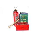A BP Motor Spirit petrol can, in green with yellow writing, together with a Antifyre extinguisher,