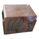 A mains radio receiver, Cossor, Model 635, in wood case of Art Deco design (Condition: see note to
