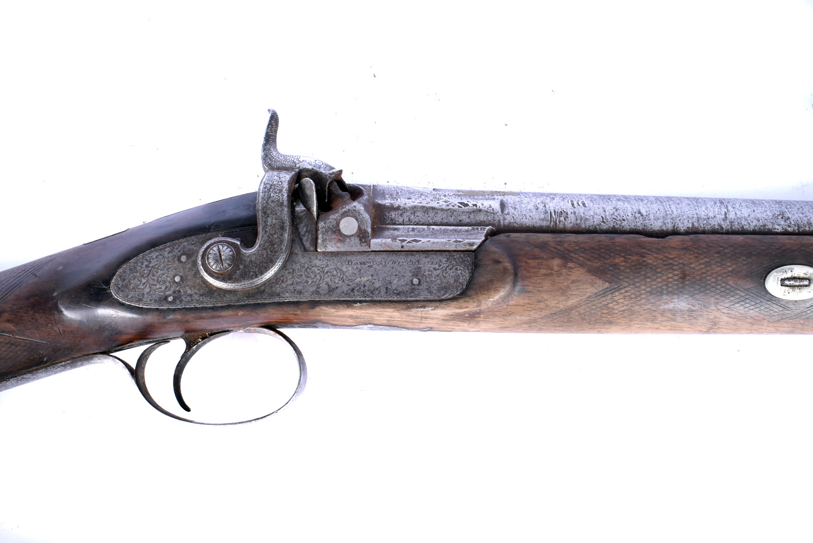 A Hammond of Winchester percussion cap rifle, with light cross-hatched design to the stock, swag