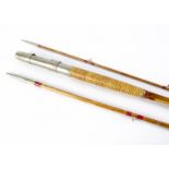 A H.L Leonard three piece cane fishing rod, the 10½ ft rod engraved W.M & Son N'York Sole Agents