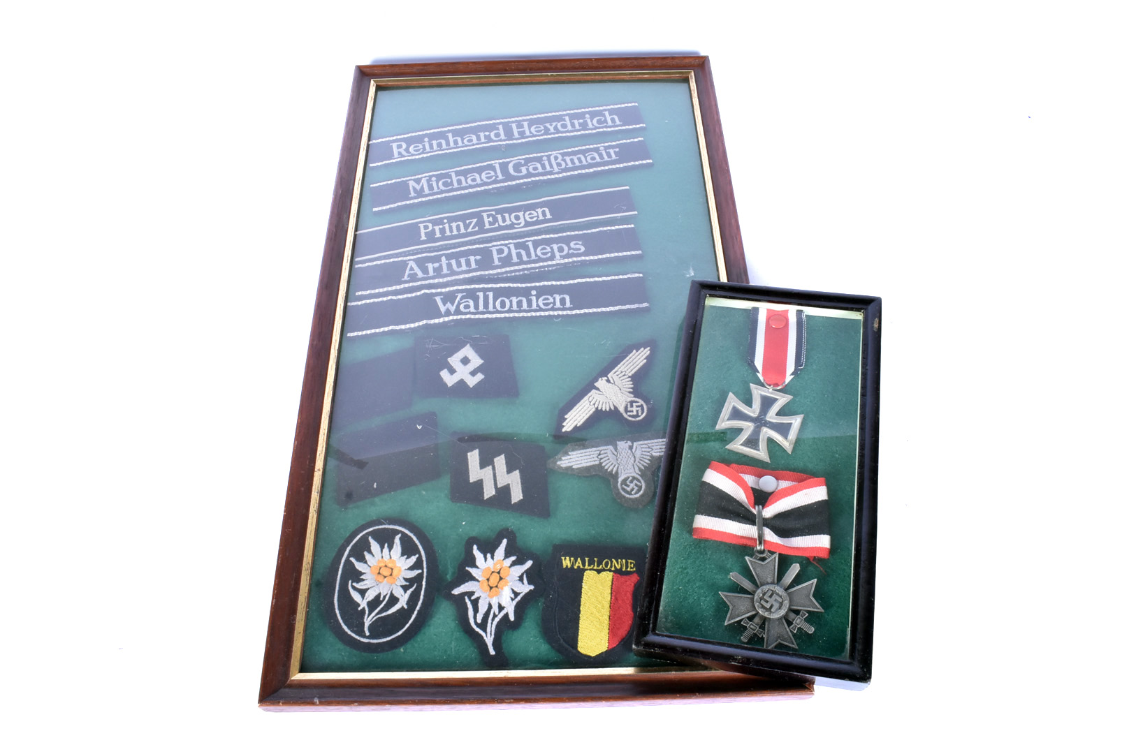 An assortment of German metals and titles, to include Iron Cross, Merit Cross with swords, cloth