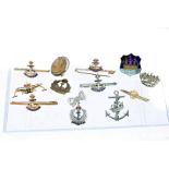 Twelve Royal Navy sweetheart brooches, gilt and white-metal examples, some with enamel and paste set