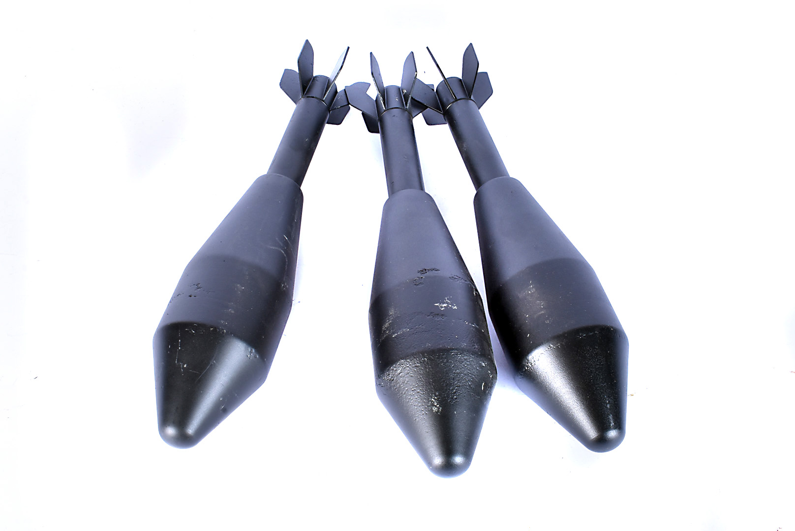 Three inert SLR grenades, in black