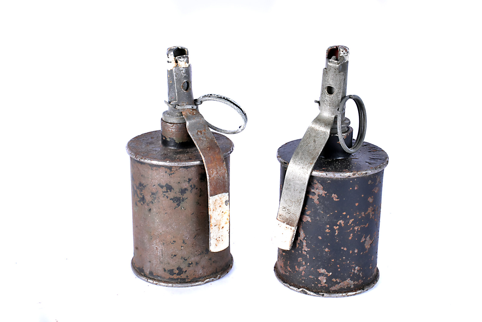Two inert Russian WWII RG42 hand grenades, complete with pin, both with various markings (2)