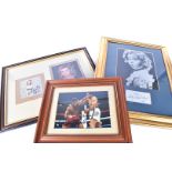 A collection of framed and glazed signed photos and prints of famous sportsmen and singers/actors,