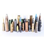A collection of inert rounds and shells, various sizes and calibres, some complete with heads