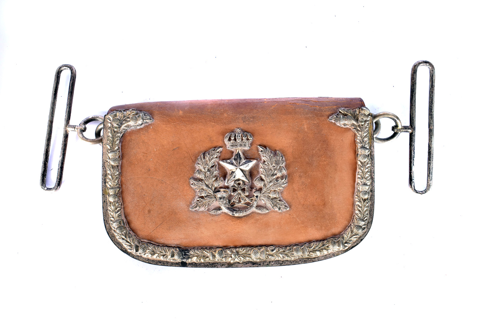 A Cameroons Royal Scottish Regiment dress pouch, the brown leather pouch with white-metal badge to