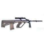 A Deactivated Austrian Steyr AUG 5.56mm assault rifle, with optical sight in the handle and