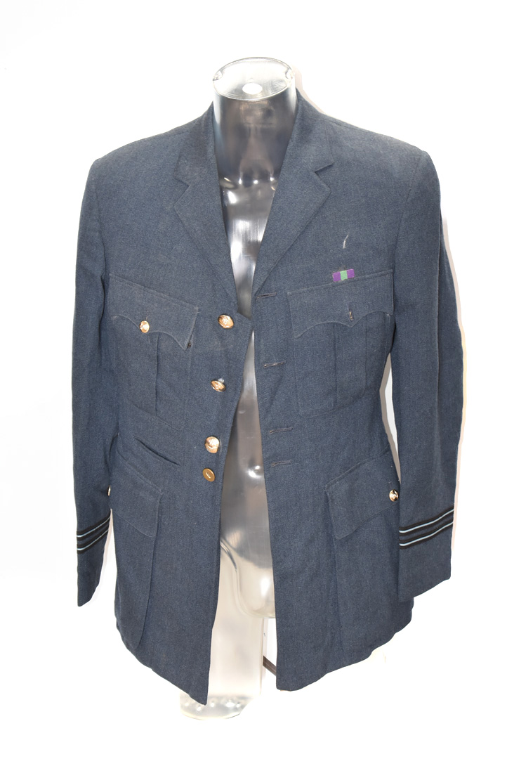 A British Royal Air Force uniform jacket, with Flight Lieutenant's stripes to cuffs, together with a