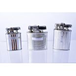 Three chrome Ronson Lighters, comprising a Gem 3, with three tortoiseshell lacquered design to