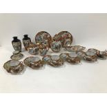 A part early 20th century Japanese egg shell porcelain tea set, two cups damaged, together with a