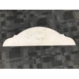 A piece of shaped marble, once from a piece of furniture but could be converted to a shelf or