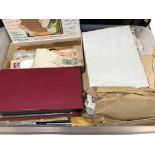 A box of Frist Day Covers and stamps and related ephemera