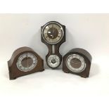 An Art Deco period Smiths eight day oak cased mantle clock, together with another similar