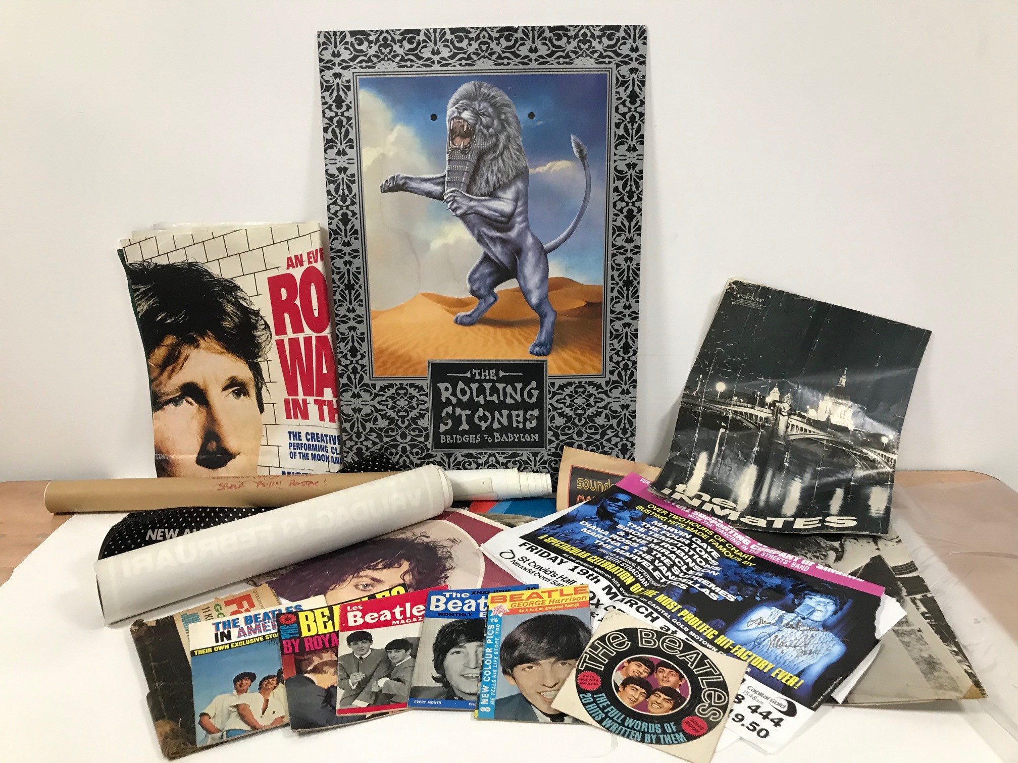 A group of music ephemera and posters, including several Beatles related magazines and leaflets, a