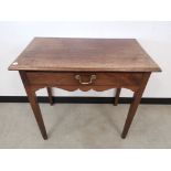 Mahogany rectangular side table, With single frieze drawer above scalloped apron, raised on